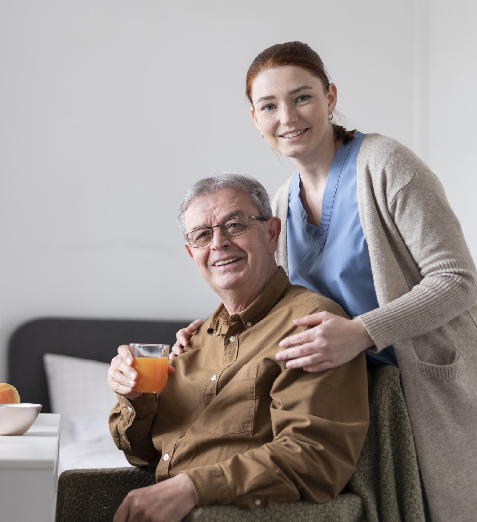 Illustration of an elderly gentleman reading with his caregiver