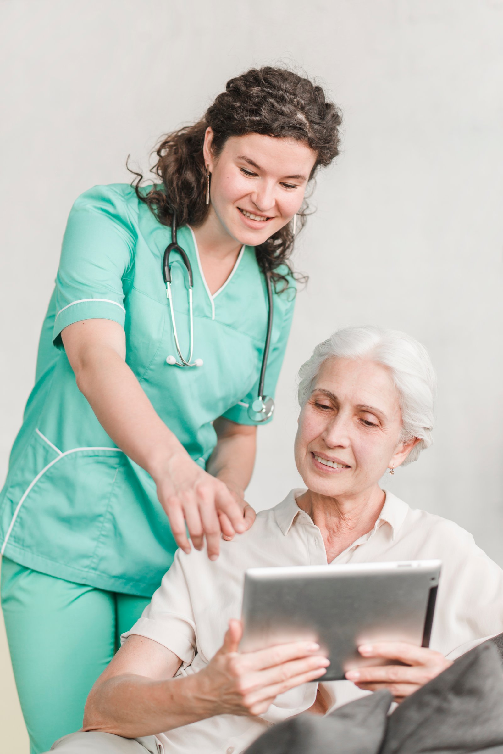 Illustration of a senior gentleman having tea with a caregiver